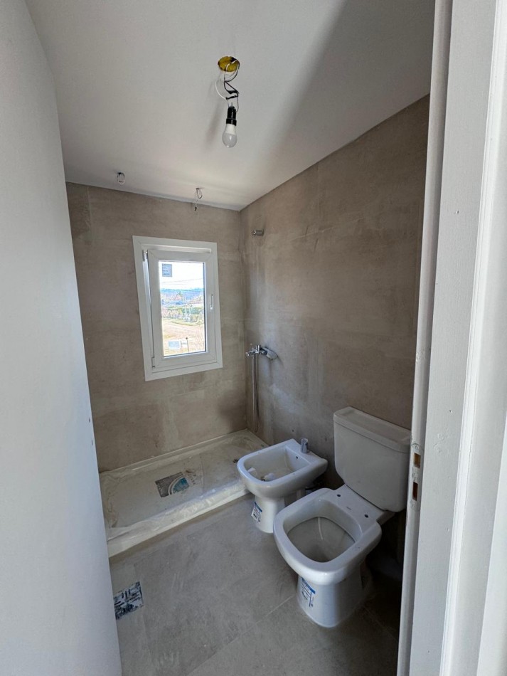 A estrenar Casa 4 jardin cochera 3 ambientes