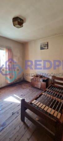 Casa en lote apto edificio en B° Ñireco, Bariloche, en venta