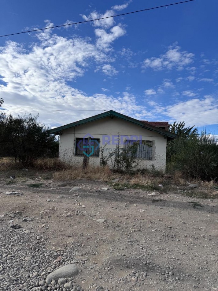 Lote ideal uso comercial con casa a reciclar