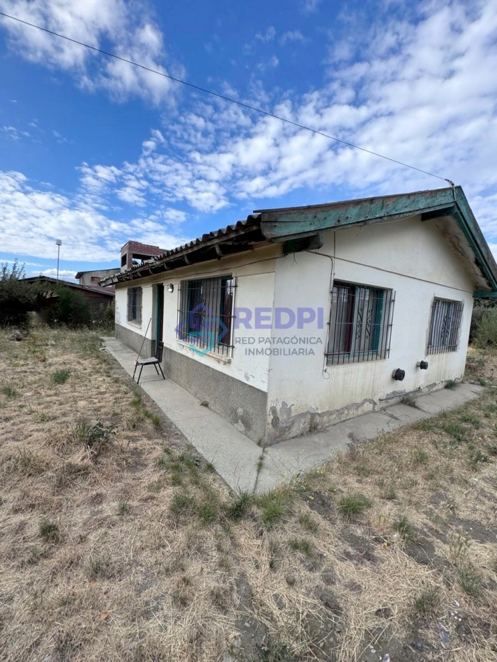 Lote ideal uso comercial con casa a reciclar